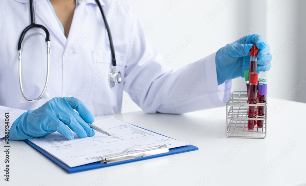 Scientists or physicians analyze the blood sample in vitro to prepare a vaccine against a new strain of viruses. Scientists or physicians analyze the blood sample in vitro to prepare a vaccine against a new strain of viruses.
