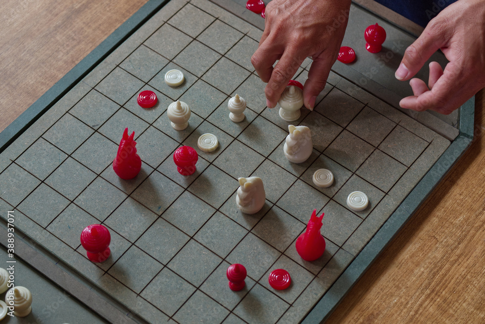Couple of Thai Men Playing a Serious Chess game in the Competition. Couple of Thai Men Playing a Serious Chess game in the Competition.