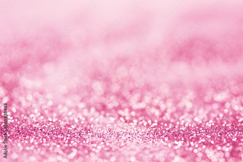 Obraz premium blurred abstract sparkling pink bokeh background. festive decoration for website banner and card concept. soft focus