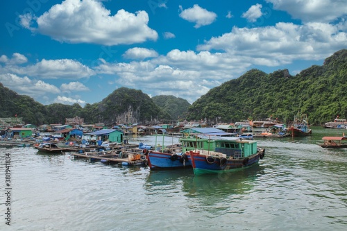 A floating fishing village in between the thousand islands of Halong Bay in Vietnam © been.there.recently