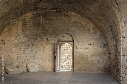 cold and spacious stone room of a medieval castle