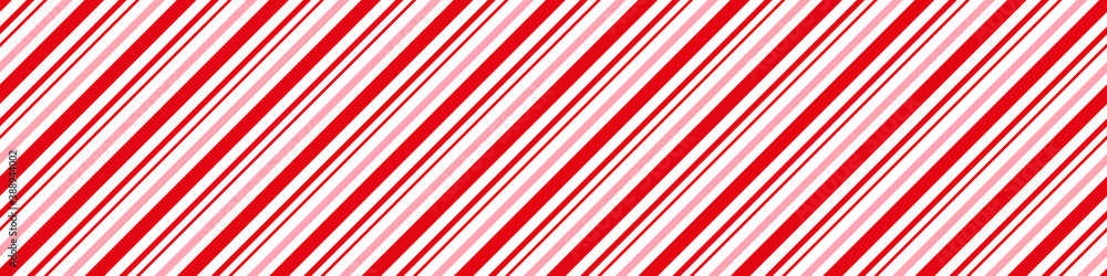 Candy cane Christmas background, peppermint diagonal stripes print seamless pattern.