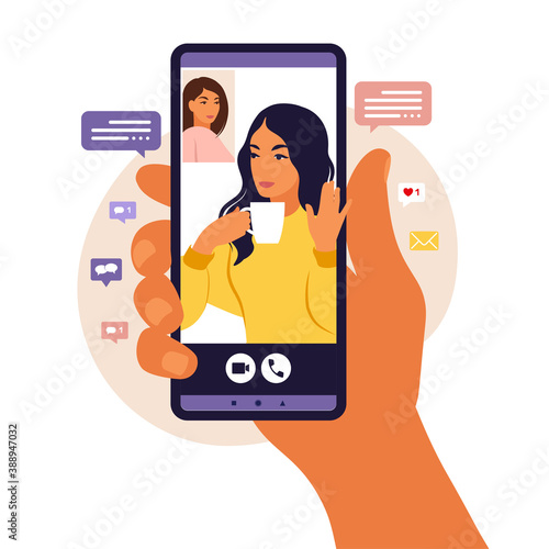 Hand holding smartphone chatting with friend during video call. Landing page. Videoconference with colleagu, distant discussion. Vector illustration. Flat style.