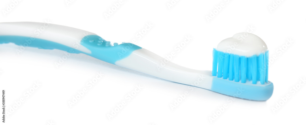 Toothbrush for children with paste isolated on white, closeup. Dental care Toothbrush for children with paste isolated on white, closeup. Dental care