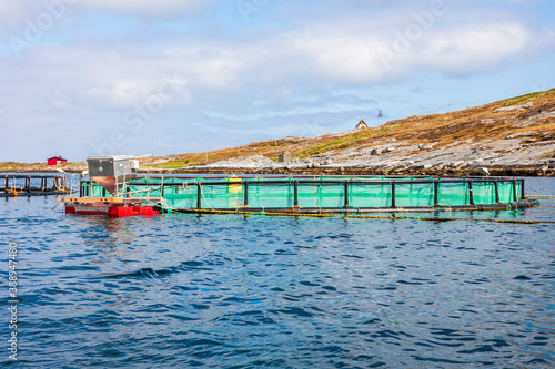 Fish cages in the sea at the coast in Norway © Lars Johansson