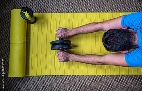 Boy doing exercise at home during the pandemic covid-19