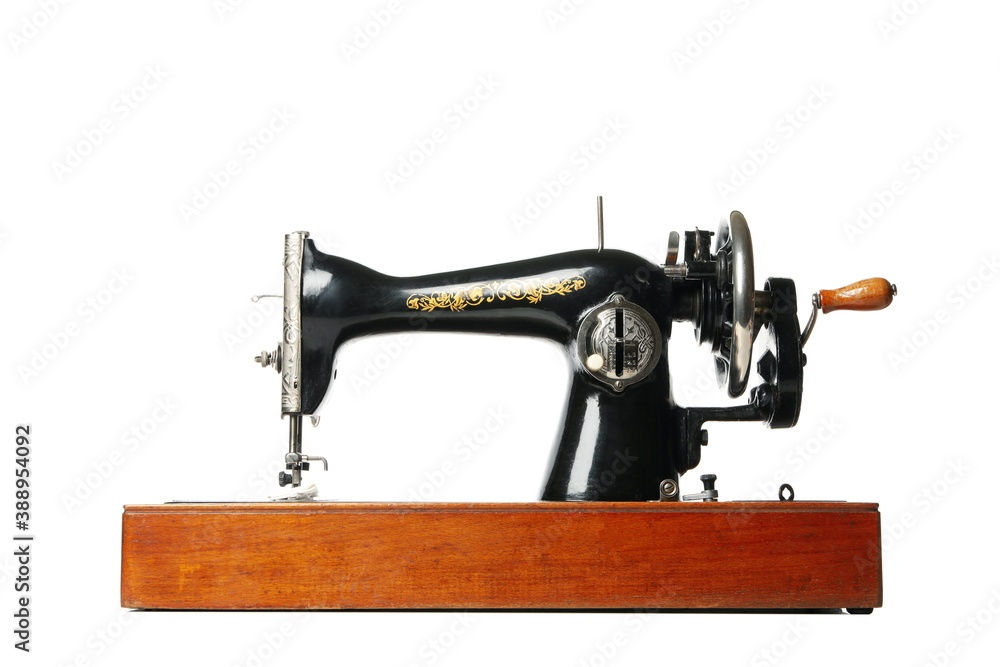 Fototapeta premium Old vintage sewing machine isolated on white background