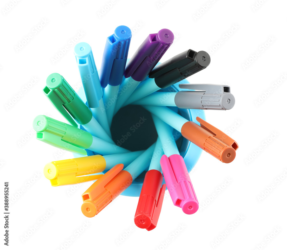 Different color felt tip pens in holder on white background, top view. School stationery Different color felt tip pens in holder on white background, top view. School stationery
