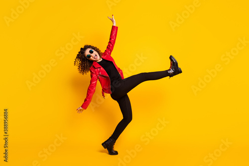 Fototapeta Naklejka Na Ścianę i Meble -  Full body profile side photo of positive girl dance raise leg isolated over bright shine color background