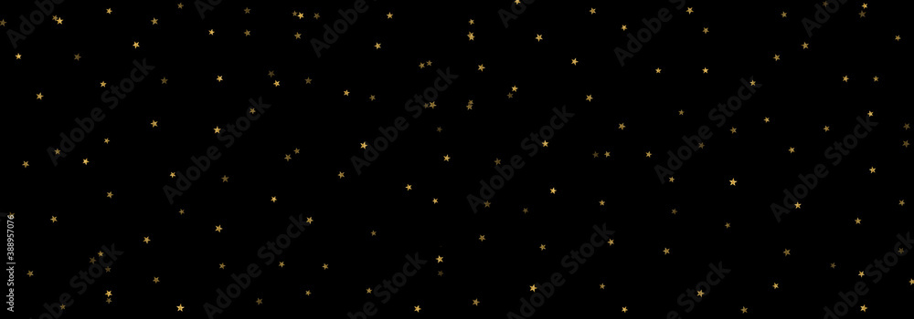 Festive background with gold stars on black, glitter, gold foil confetti