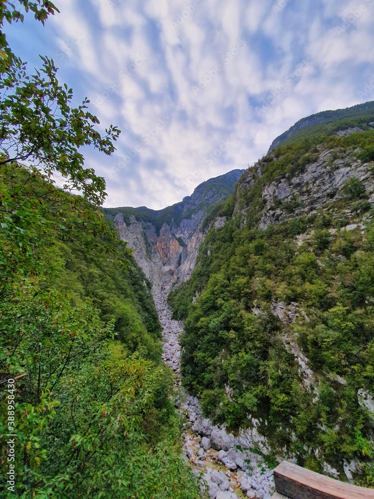 Waterfall Boka in Slovenia near Soca river. Waterfall in the mountains. 