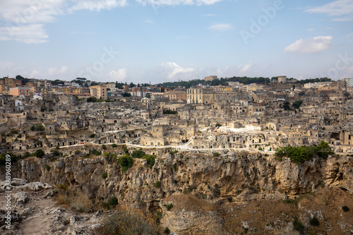 Panoramic view of Sassi di Matera a historic district in the city of Matera, well-known for their ancient cave dwellings from the Belvedere di Murgia Timone, Basilicata, Italy