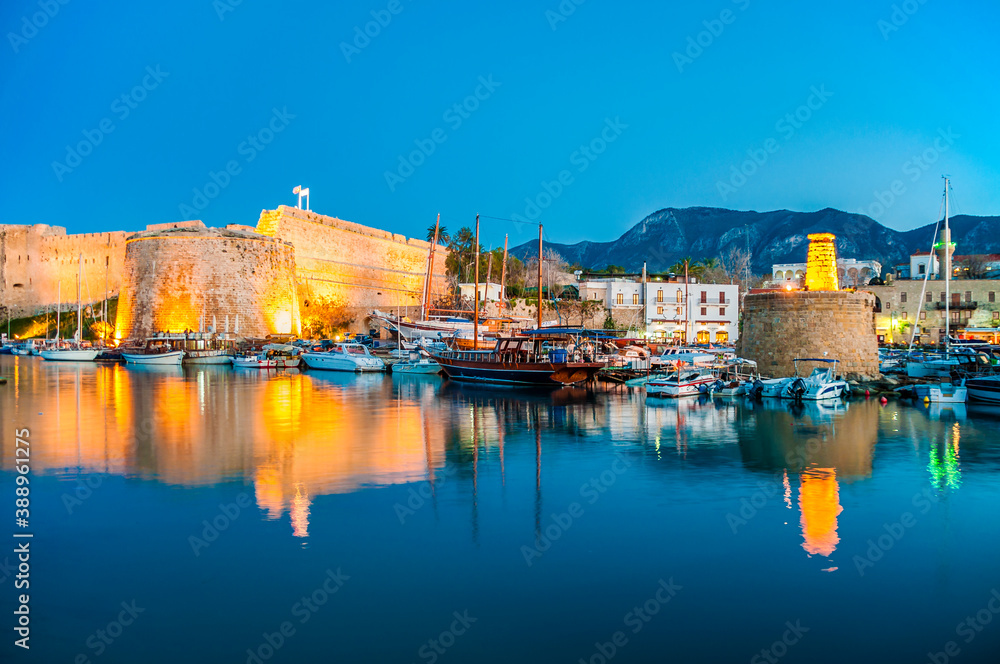 Blue hour view in Kyrenia harbour on . Kyrenia harbor is a famous tourist resort.