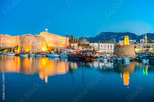Blue hour view in Kyrenia harbour on . Kyrenia harbor is a famous tourist resort. © nejdetduzen