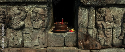 place to put incense in front of the main building of the sukuh temple photo