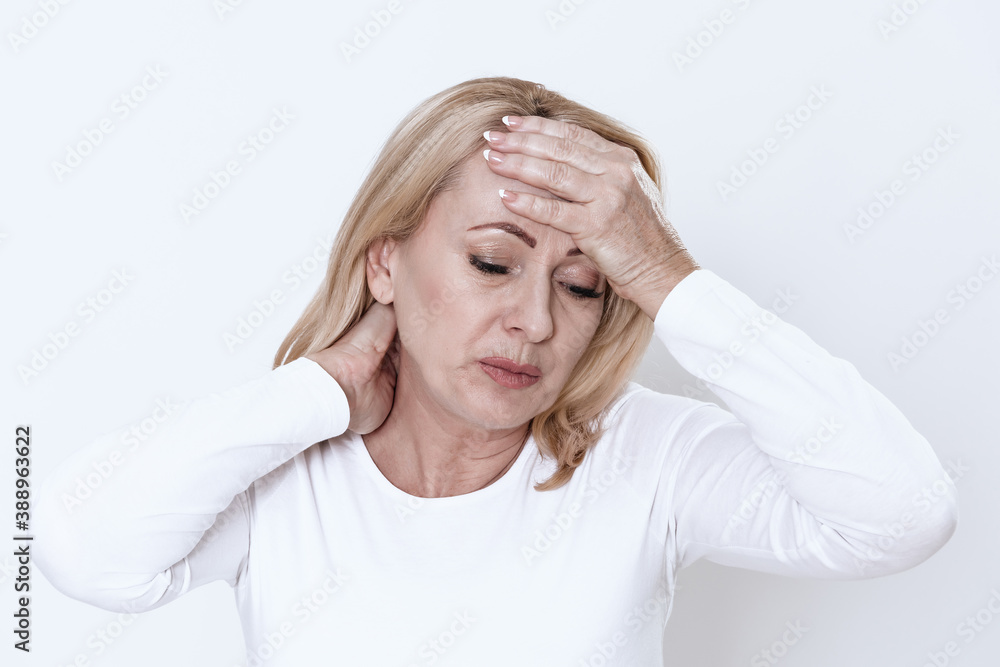 Girl with a virus holds onto her head. Girl with a virus holds onto her head.