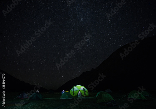 tent camp at night in the mountains