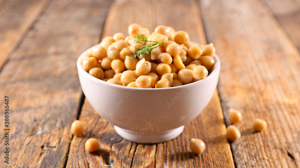 bowl of chickpea on wood background bowl of chickpea on wood background