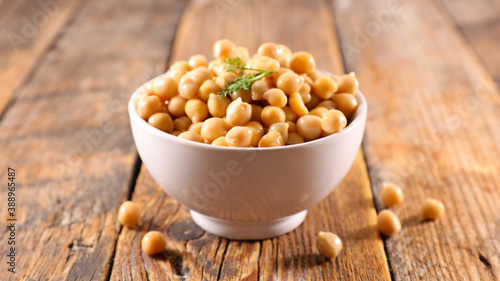 bowl of chickpea on wood background photo