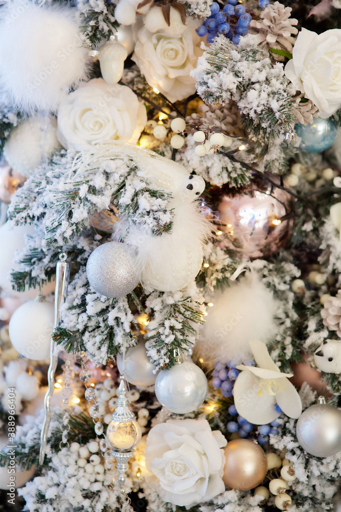 Elegant decorated with balls and figures Christmas tree. Elegant decorated with balls and figures Christmas tree.