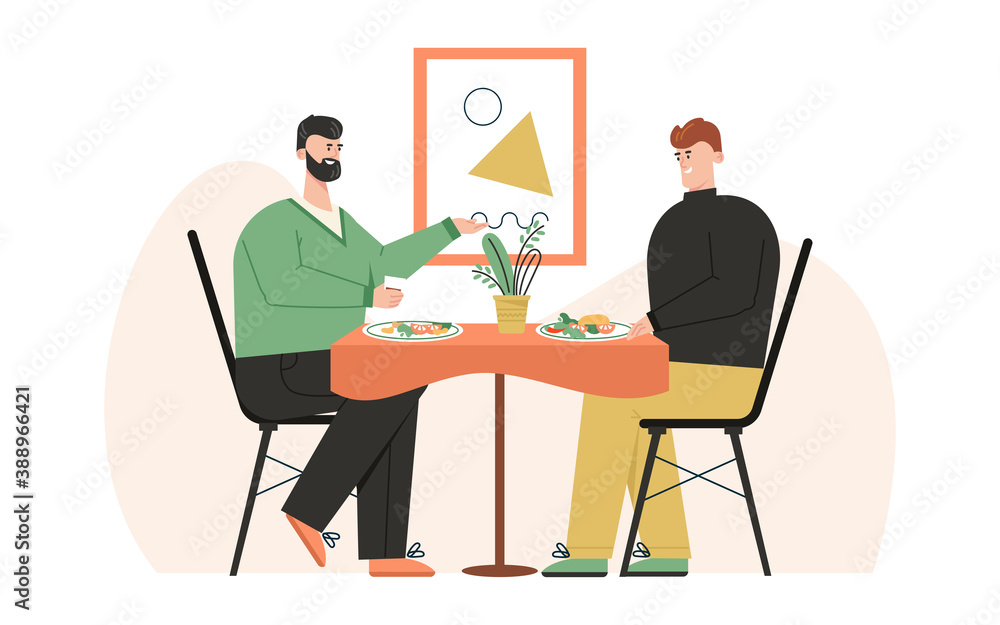 Happy male LGBT family have romantic dinner at home