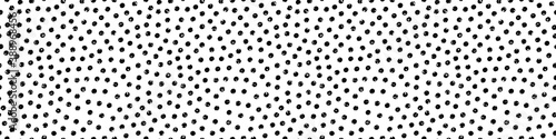 Black and white terrazzo textured polka dots vector seamless border. Monochrome banner with textural grunge inky round circles. Tossed random effect design. Shabby chic style for ribbon, edging, trim