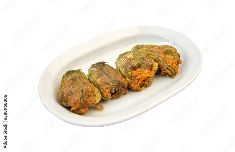 Top view Turkish and Arabic Traditional Food Kabak Cicegi Dolmasi on isolated white background Top view Turkish and Arabic Traditional Food Kabak Cicegi Dolmasi on isolated white background
