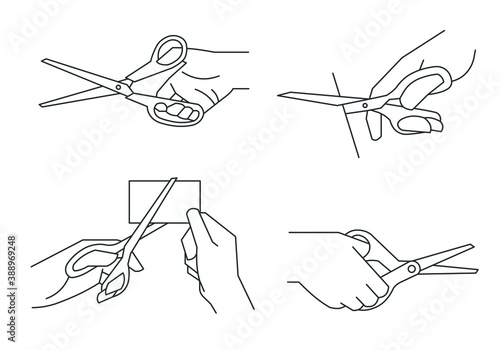 Hand holding scissors cutting paper line illustration