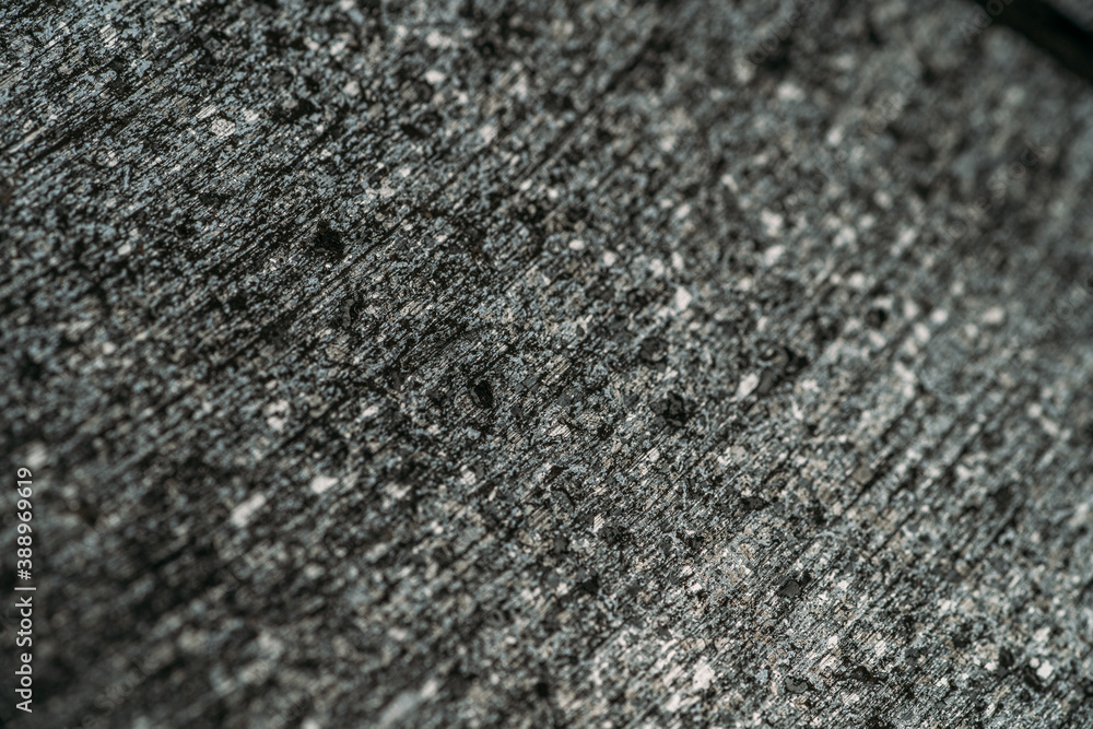Rough textured gray surface metal or stone texture as background for design. Rough textured gray surface metal or stone texture as background for design.