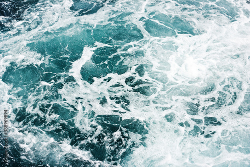 Ocean wave background. Bubble water backdrop. Turbulent sea texture. Messy water flow. Depth of the sea. Water foam surface backdrop. © Paweł Michałowski