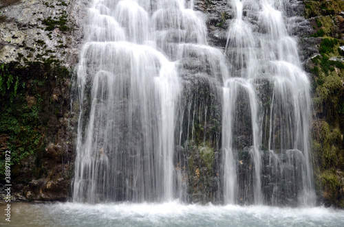 Horizontal image of a waterfall in a river