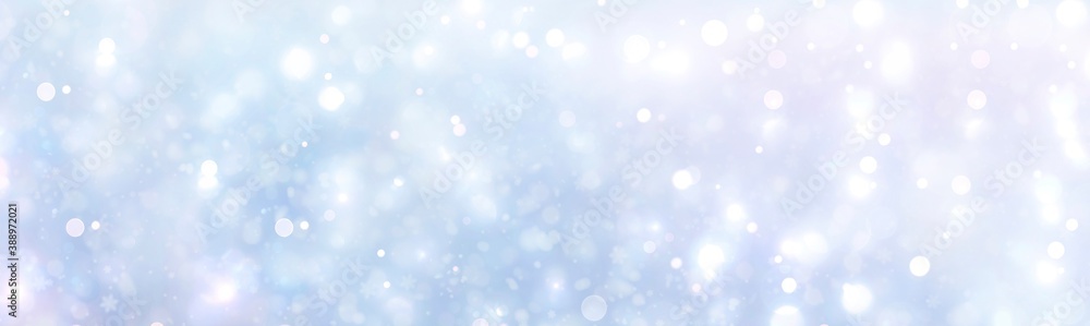Blue Christmas winter background - beautiful bokeh lights with snowflakes
