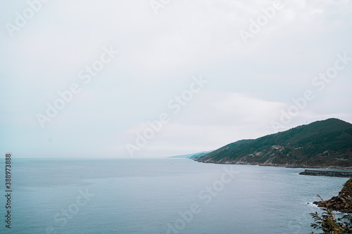 Beautiful beach landscape of the Basque Country Spain. Beach wave textures