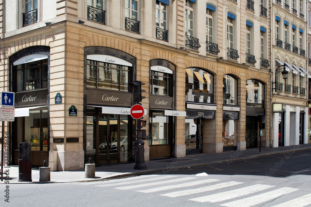 Luxury shopping street Rue Saint Honore in Paris. Famous brands' shops are  in the view Stock Photo