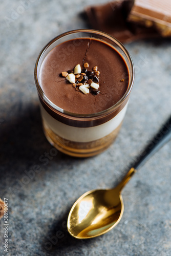 Delicious chocolate and cream dessert in the glass