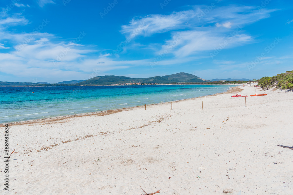 White sand and turquoise sea in Maria Pia beach in Alghero