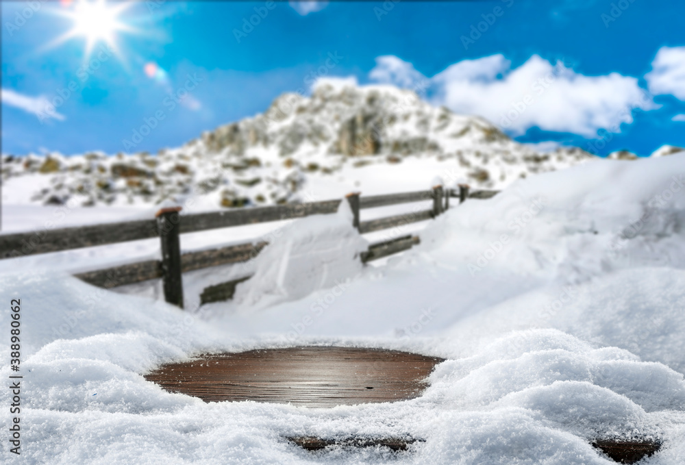 Fototapeta premium Desk of free space and winter landscape of mountains