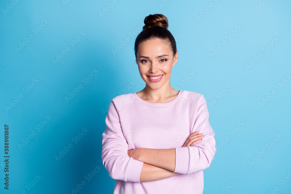 Photo of charming lovely girl cross hands enjoy working wear good look pullover isolated over blue color background Photo of charming lovely girl cross hands enjoy working wear good look pullover isolated over blue color background