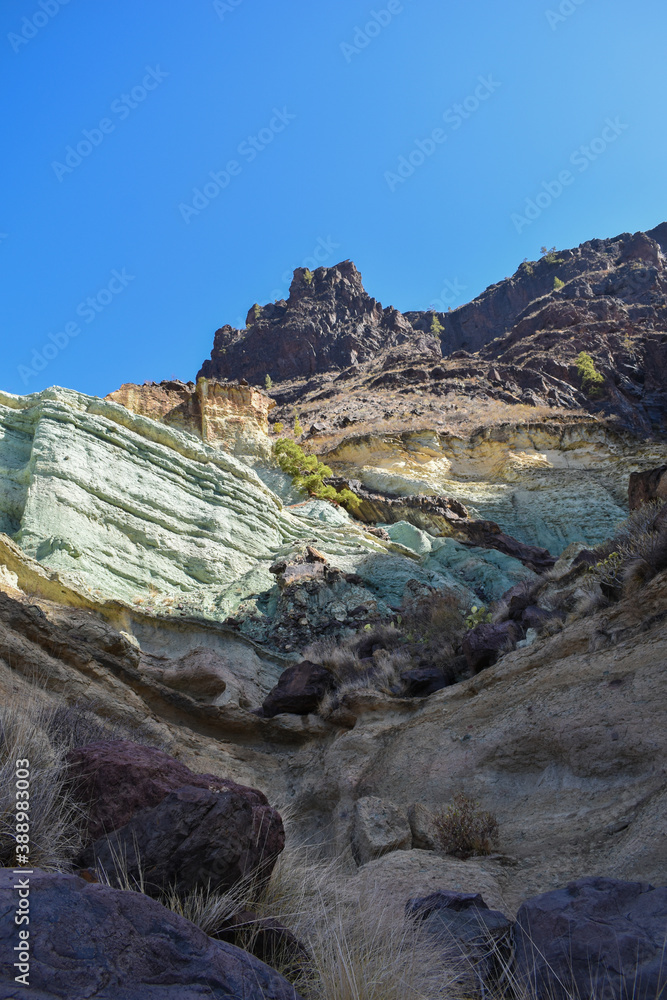 Beautiful volcanic landscape in Gran Canaria - colorful rocks of Los Azulejos. Effect of hydromagmatic eruptions.