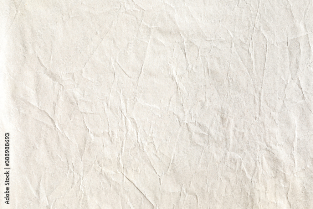 Old brown crumpled paper background texture
Old brown crumpled paper background texture