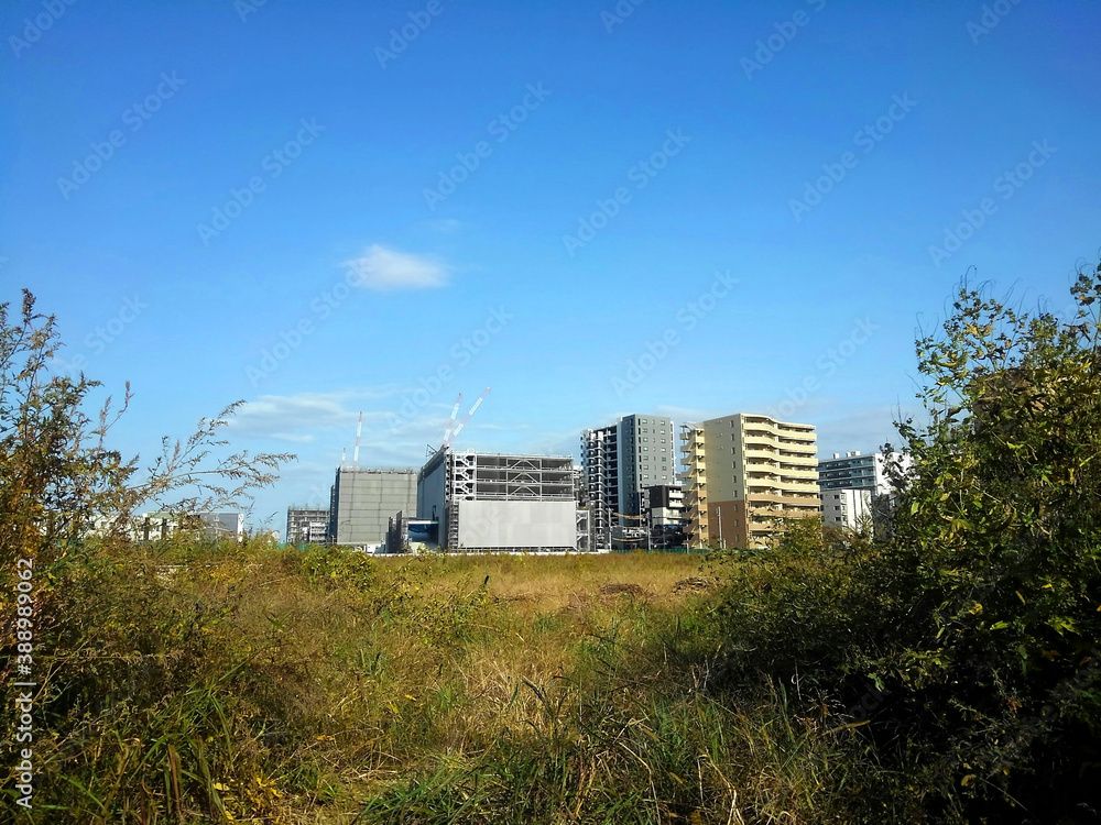 Autumn sky, land for construction and building under construction Autumn sky, land for construction and building under construction