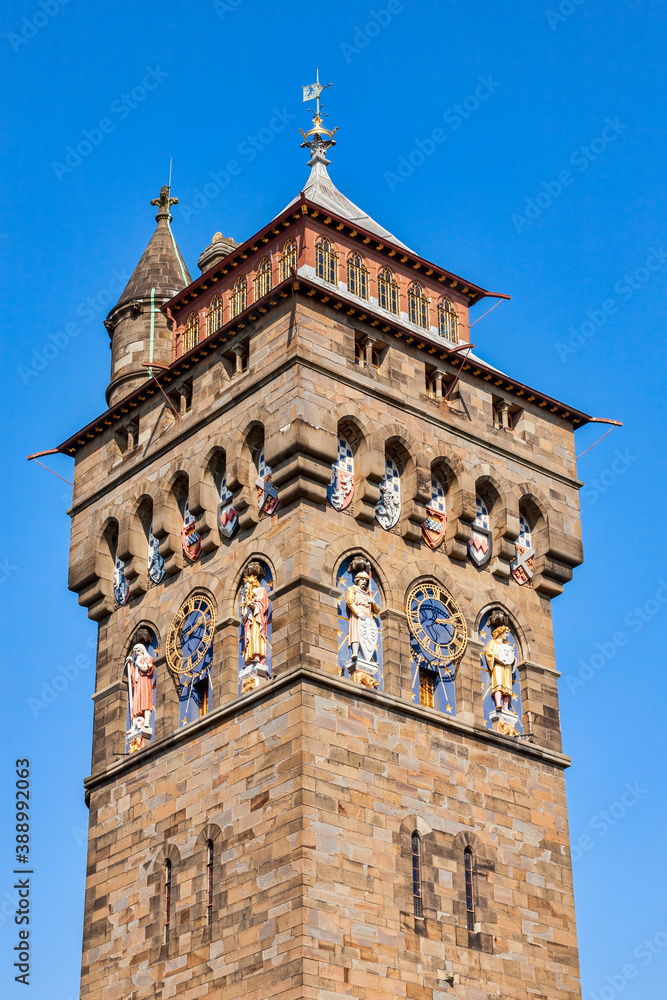 The clock tower of Cardiff Castle Wales UK completed in 1873 which is part of the wall of the 12th century Norman fort which is a popular tourism travel destination attraction landmark of the city