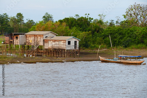 Tropical Amazon landscape shortly before sunset, idyllic villages of small farmers and fishermen on the banks of the Amazon River near Curuari Óbidos, Paraná do Amador, state of Pará, Brazil