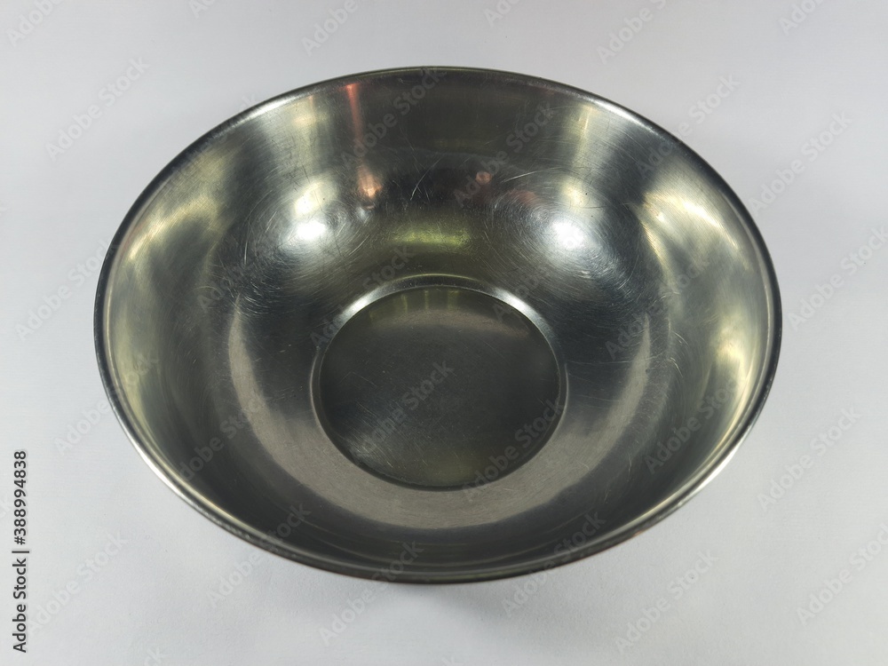 Stainless steel bowl in white background.   Isolated the Bowl.  It is a very useful pots.
