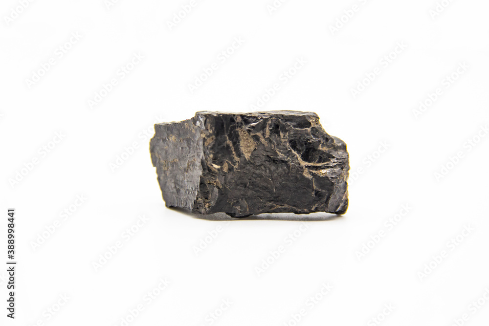 Natural black coal isolated in white background. Dirty coal stones. Natural black coal isolated in white background. Dirty coal stones.