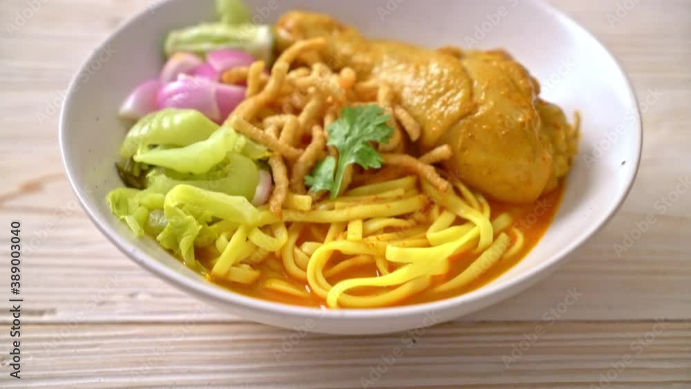 Northern Thai noodle curry soup with chicken (Kao Soi Kai) - Thai food style Northern Thai noodle curry soup with chicken (Kao Soi Kai) - Thai food style