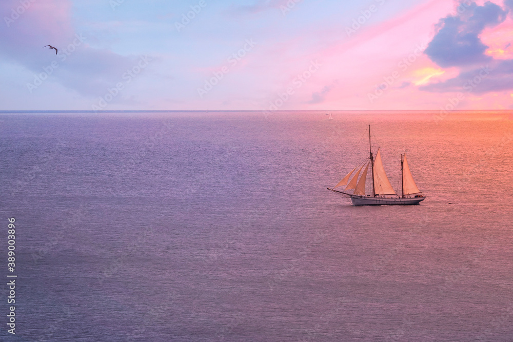 Fototapeta premium sailboat at sunset