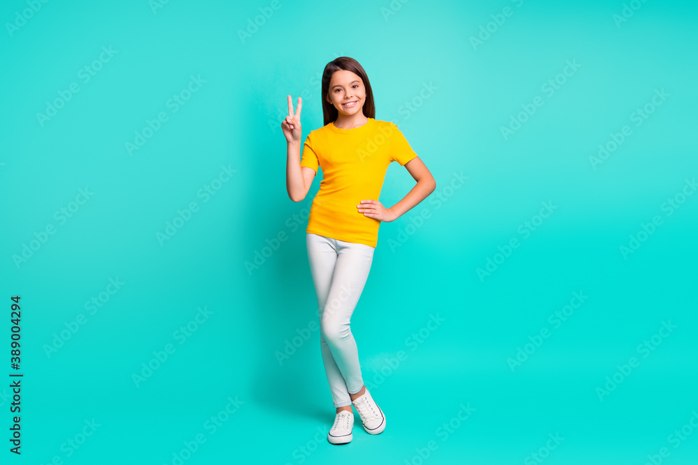Full size photo of positive kid girl make selfie standing isolated over teal color background Full size photo of positive kid girl make selfie standing isolated over teal color background