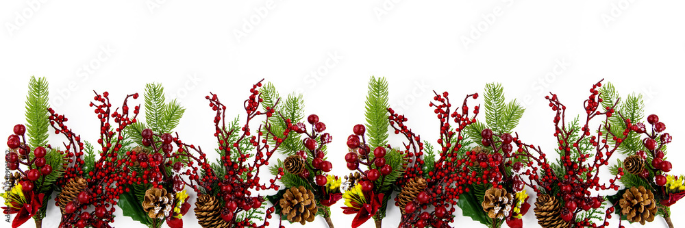 Christmas flat composition on a white background decorative branches with fir branches, cones and red berries. Banner.