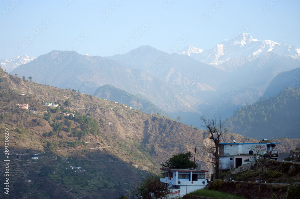Indian Himalayas, mountain slopes, hillside village, tree houses